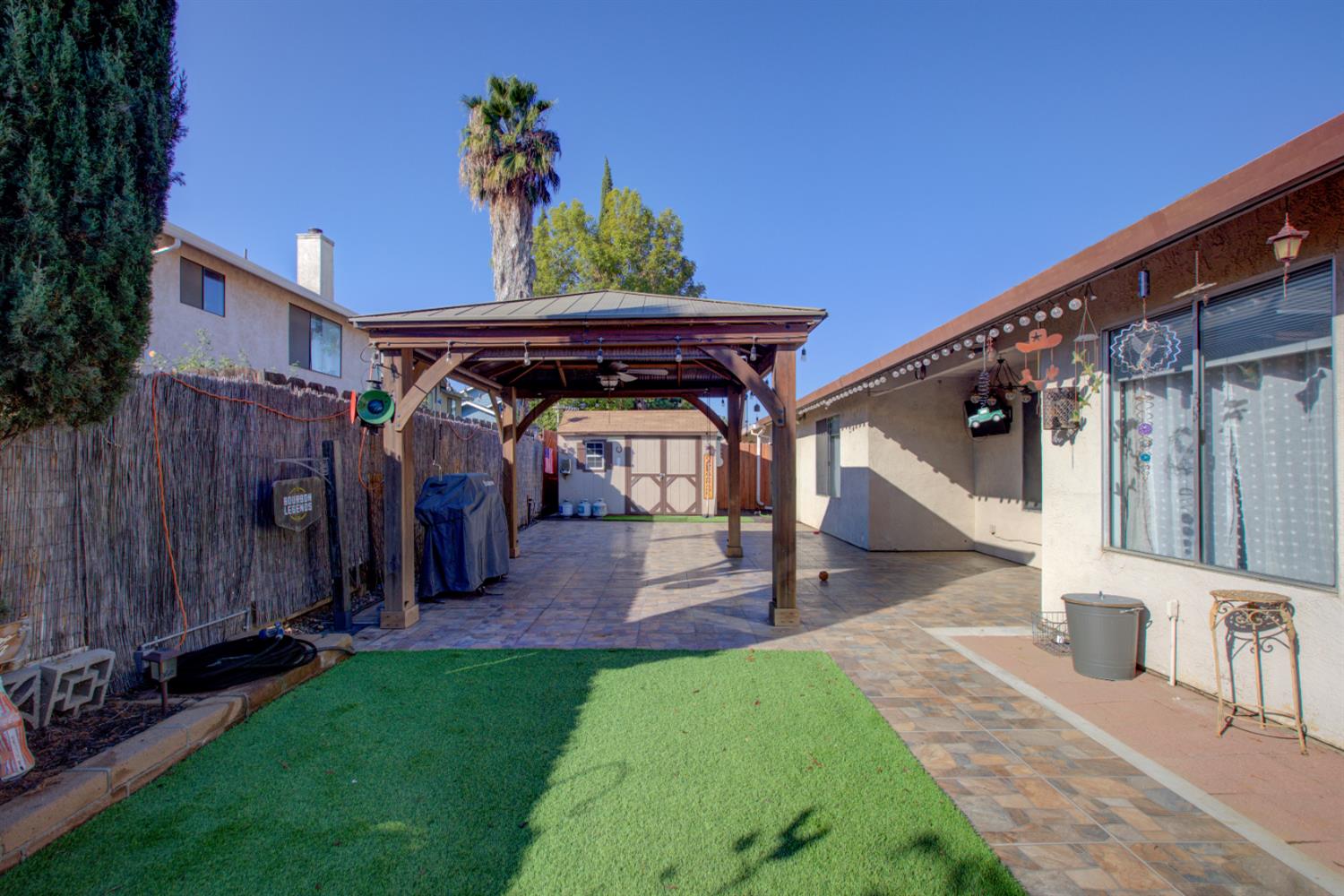 604 Kinshire Way Patterson, CA 95363 - Photo 34 of 42 a view of a porch with seating space