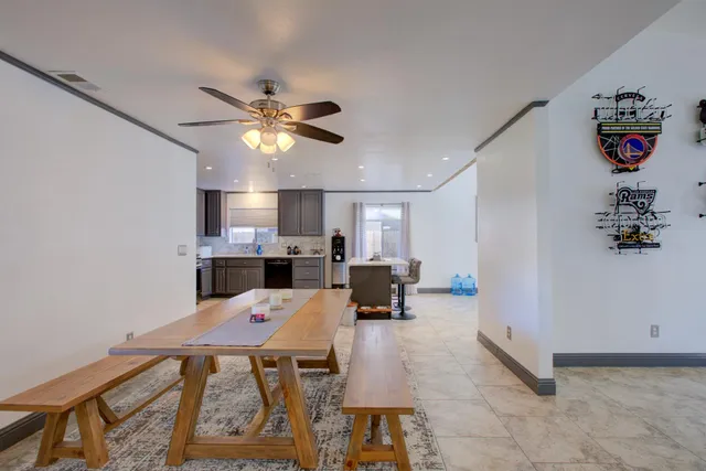a living room with furniture and a table