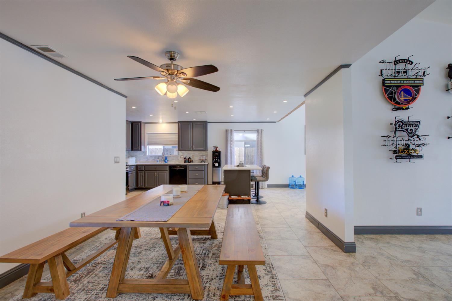 604 Kinshire Way Patterson, CA 95363 - Photo 10 of 42 a view of a dining room with furniture