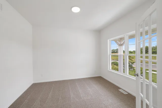 an empty room with a window