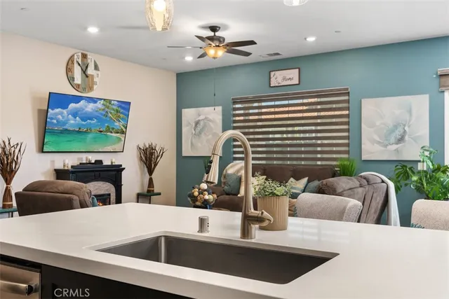 a dining room with furniture window and wooden floor