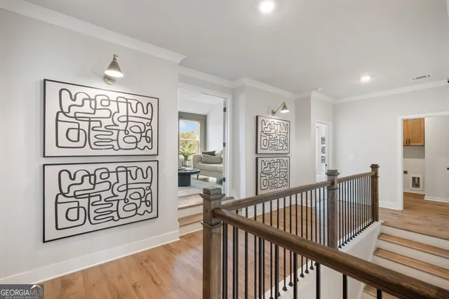 a front view of a house with a yard table and chairs