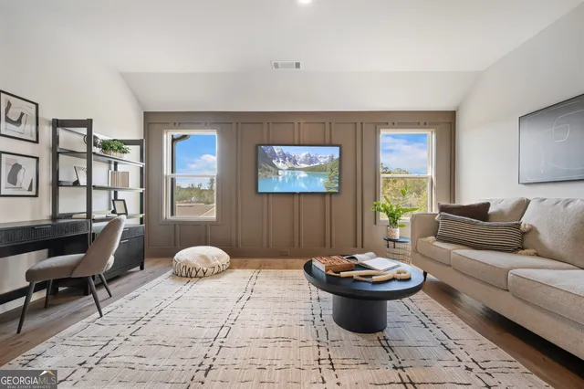 a group of people sitting in front of a store