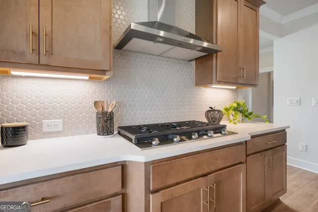 a spacious bedroom with a bed and ceiling fan