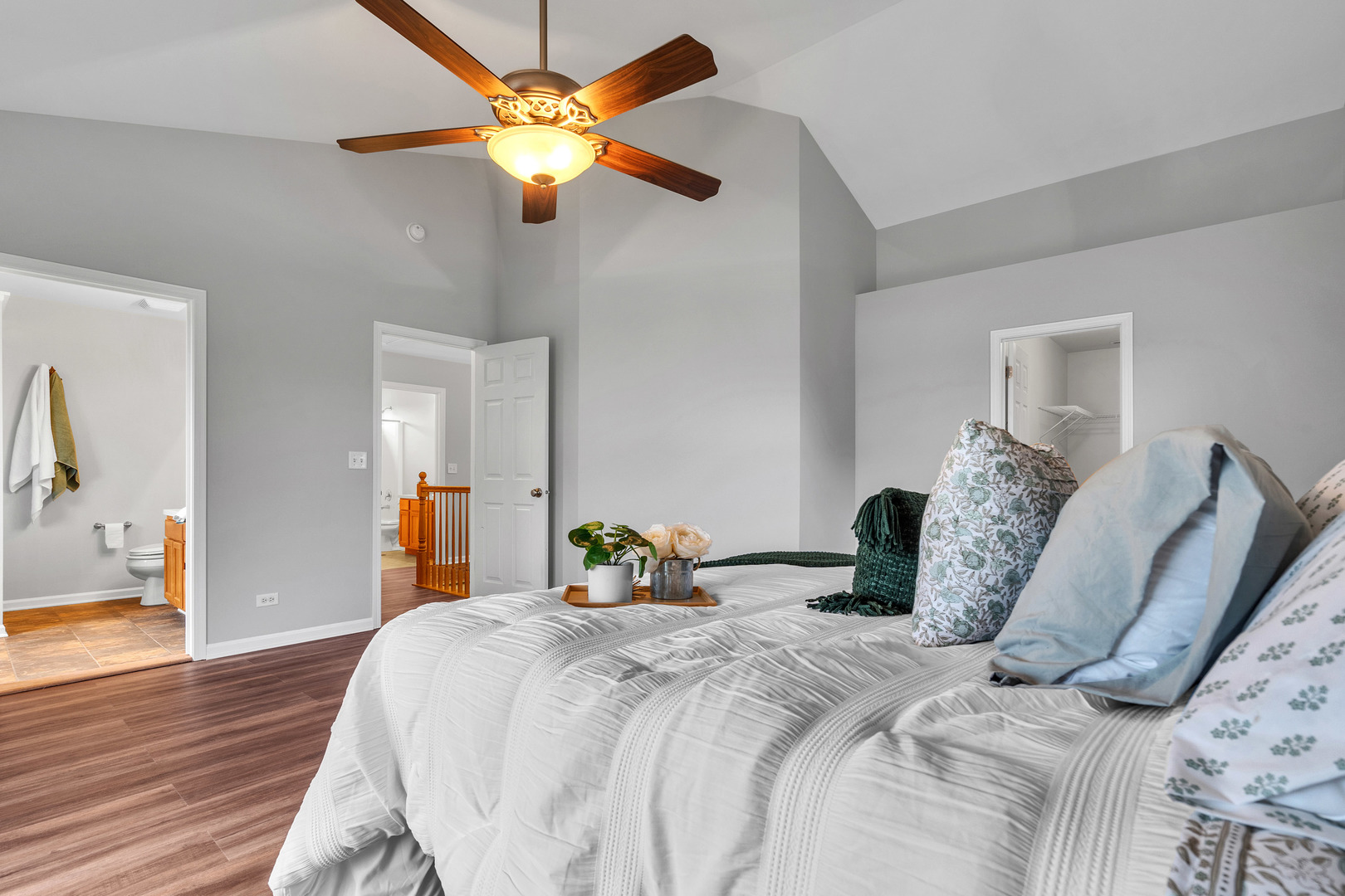 2513 Simon Drive Montgomery, IL 60538 - Photo 19 of 33 a bedroom with a bed and wooden floor