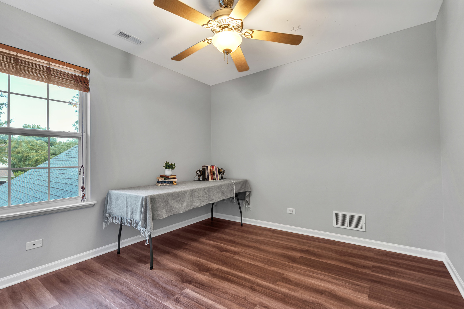 2513 Simon Drive Montgomery, IL 60538 - Photo 24 of 33 a view of a workspace with furniture and a window
