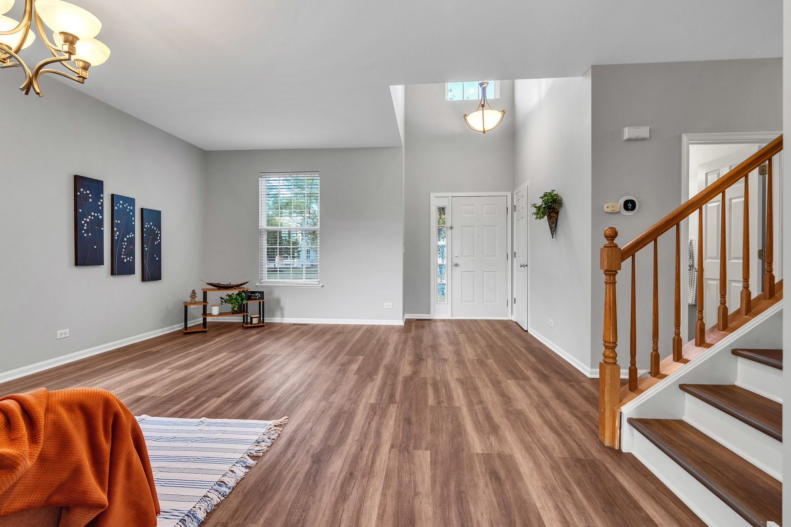 2513 Simon Drive Montgomery, IL 60538 - Photo 3 of 33 a view of empty room with wooden floor and fan
