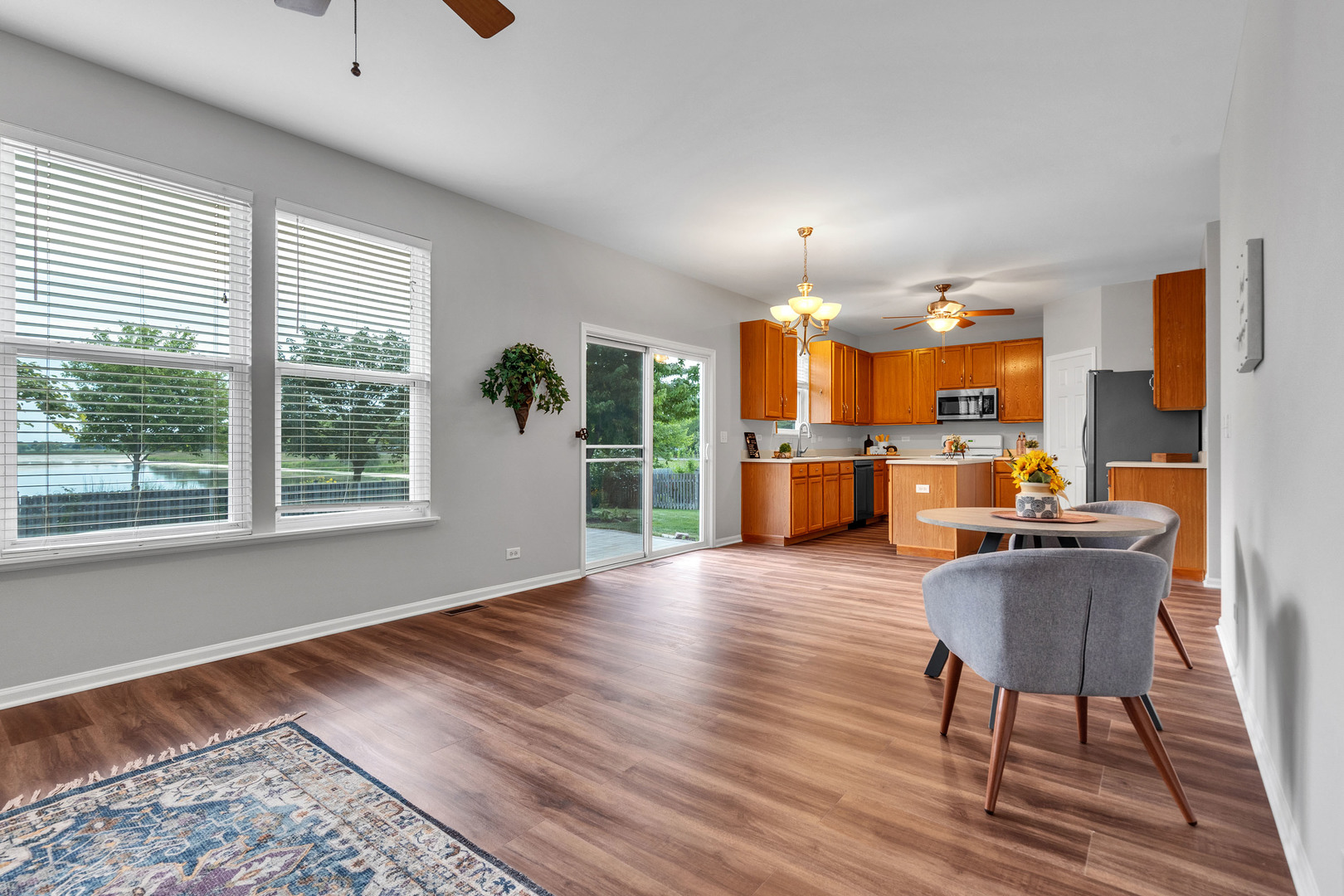 2513 Simon Drive Montgomery, IL 60538 - Photo 8 of 33 a living room with furniture and a wooden floor
