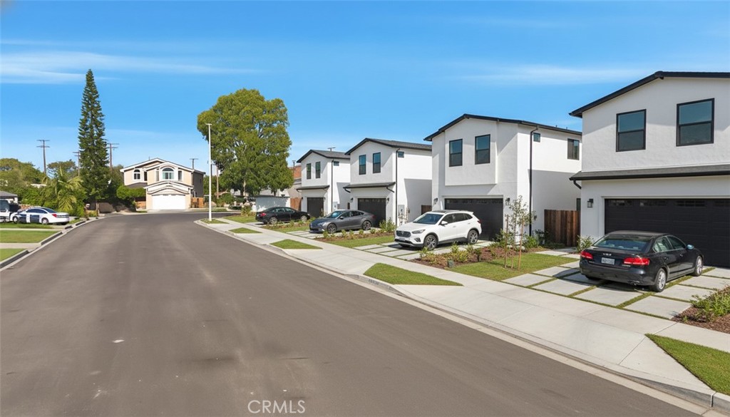 11460 Cresson Street Norwalk, CA 90650 - Photo 9 of 13 a front view of a house with a yard