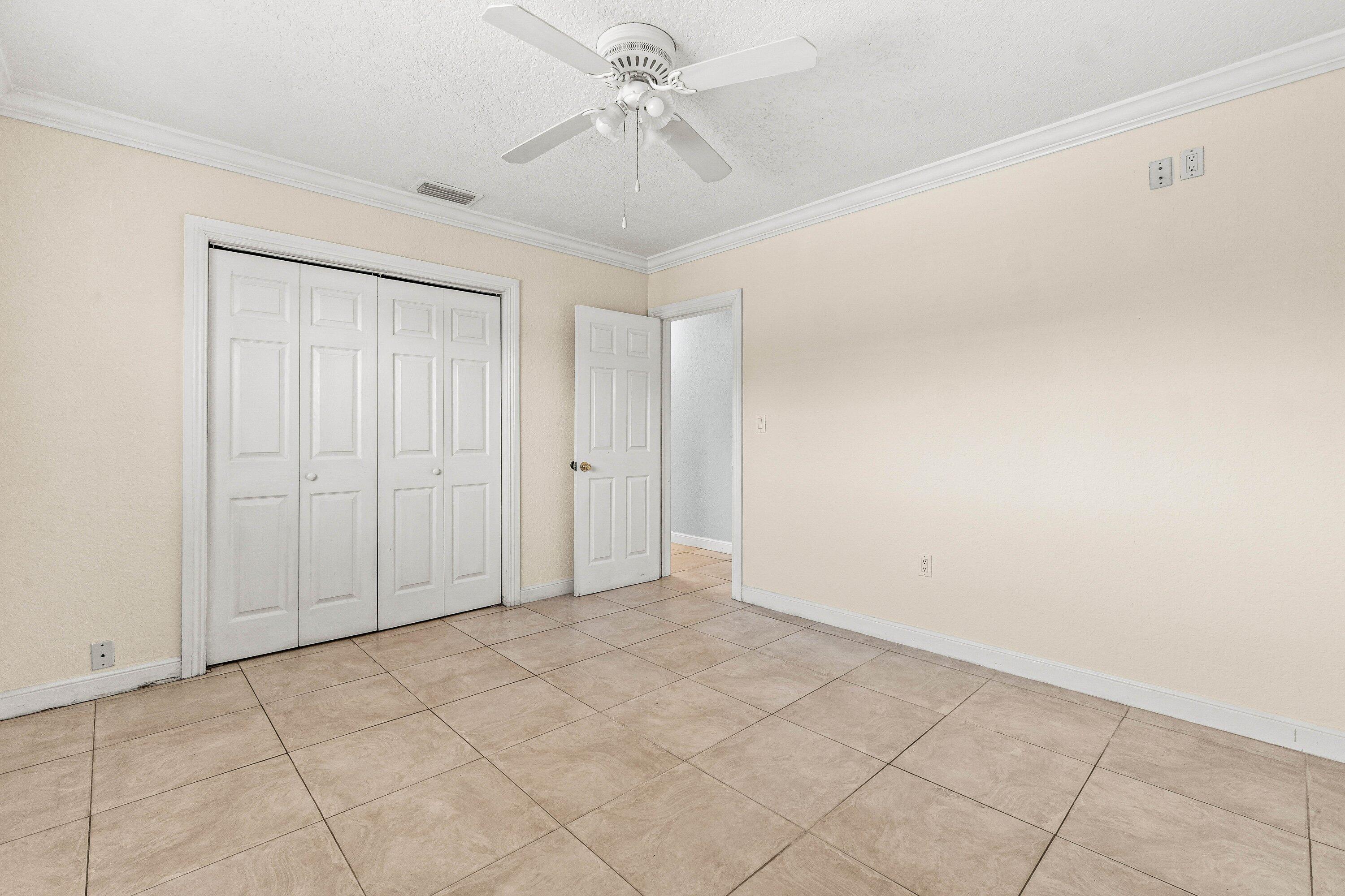 200 Southwest 7th Street, Unit 3 Boca Raton, FL 33432 - Photo 23 of 35 a view of an empty room