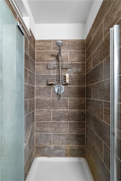 1204 Fannin Street George West, TX 78022 - Photo 17 of 24 a bathroom with a shower