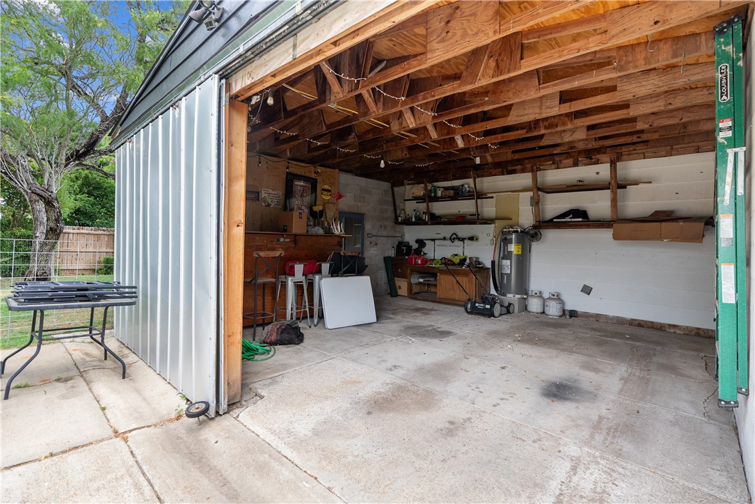 1204 Fannin Street George West, TX 78022 - Photo 23 of 24 a view of a storage room with utility room