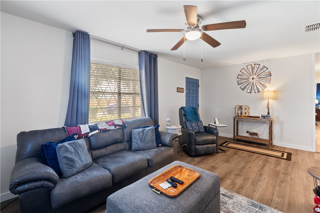 1204 Fannin Street George West, TX 78022 - Photo 4 of 24 a living room with furniture and a window