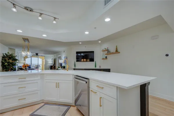 a kitchen with a sink and cabinets