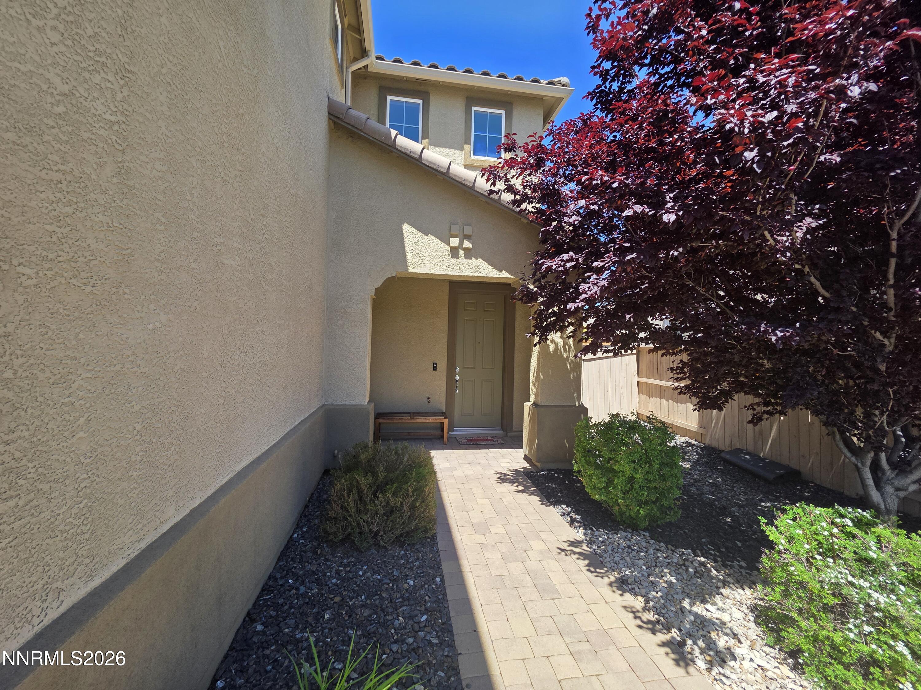 2775 Bonfire Lane Reno, NV 89521 - Photo 2 of 41 a house with trees in front of it