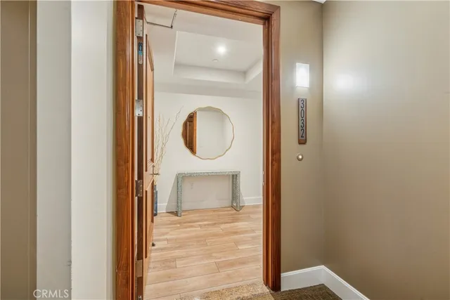 a view of a bathroom from a hallway