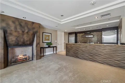 a view of an empty room and fire place