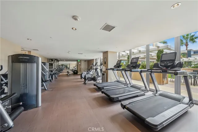 a living room with lots of furniture and a flat screen tv
