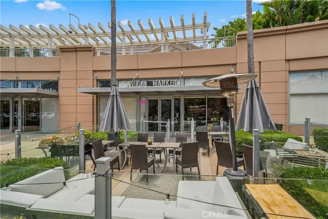 a view of a cafe with sitting area
