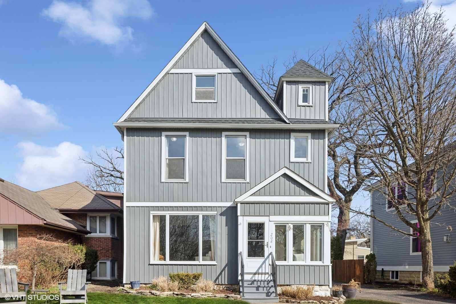 208 Fairbank Road Riverside, IL 60546 - Photo 1 of 29 a front view of a house with a yard