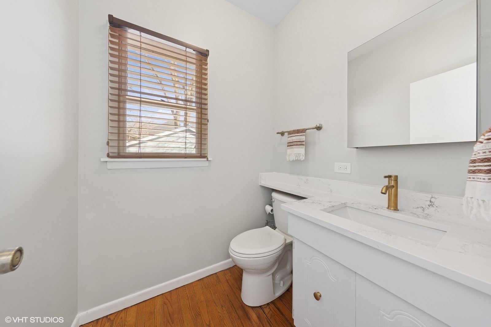 208 Fairbank Road Riverside, IL 60546 - Photo 14 of 29 a bathroom with a toilet a sink and a window