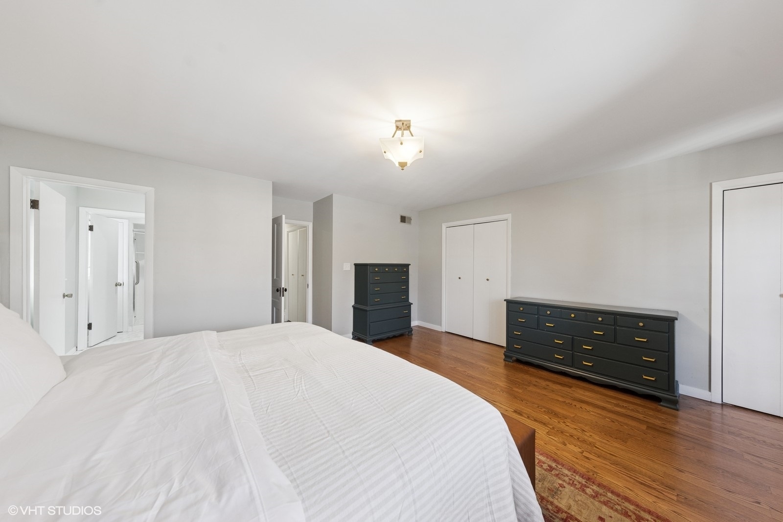 208 Fairbank Road Riverside, IL 60546 - Photo 20 of 29 a spacious bedroom with a bed and a dresser
