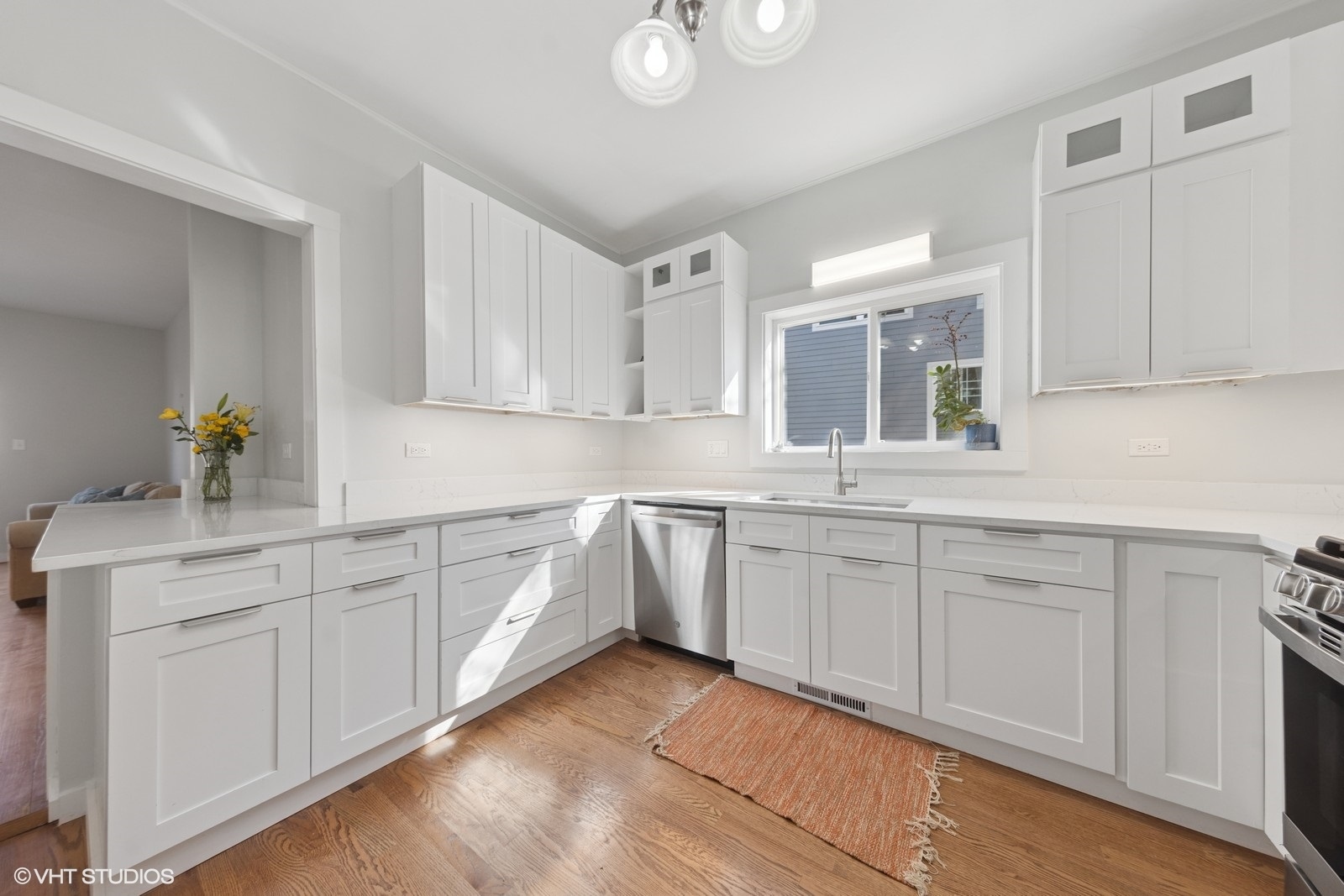 208 Fairbank Road Riverside, IL 60546 - Photo 10 of 29 a kitchen with a sink cabinets and window