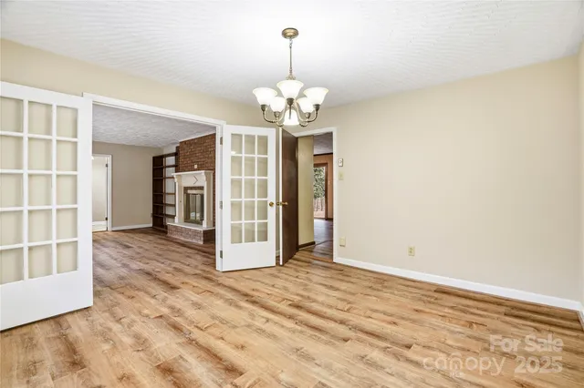 a kitchen with stainless steel appliances kitchen island granite countertop a sink and cabinets