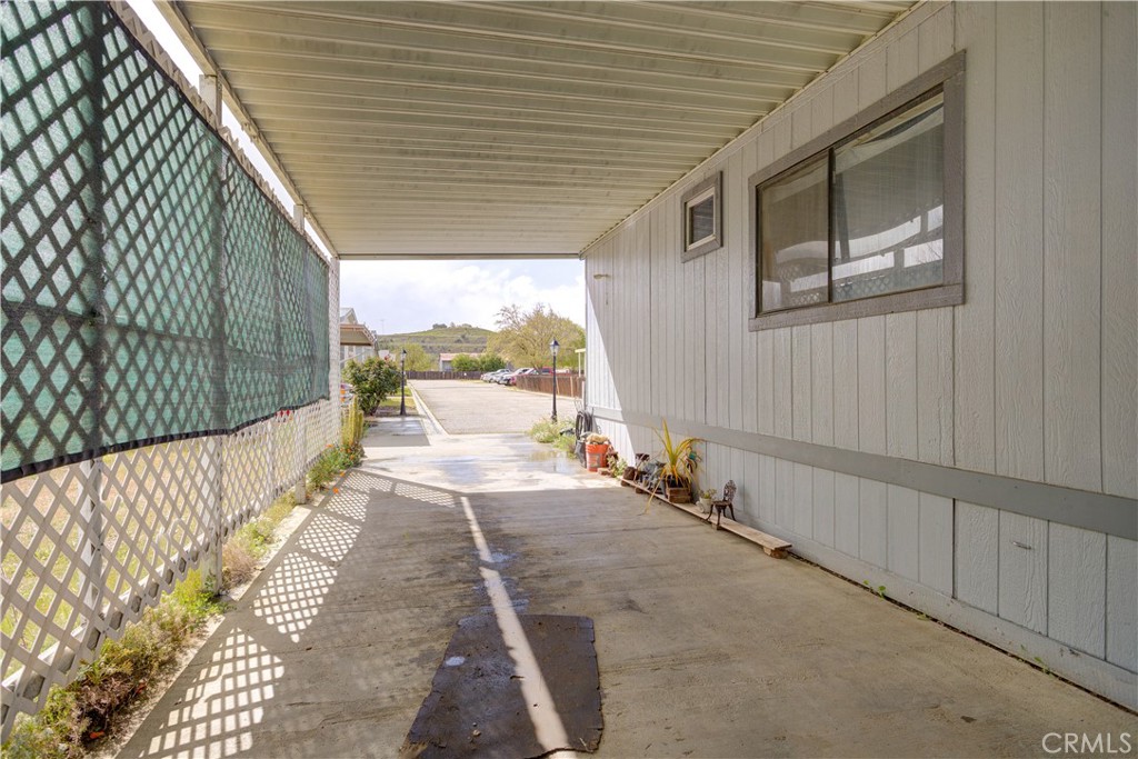 700 River Road, Unit 12 San Miguel, CA 93451 - Photo 5 of 13 a balcony with wooden floor