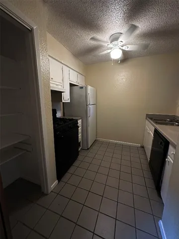 a view of a utility room with an empty space