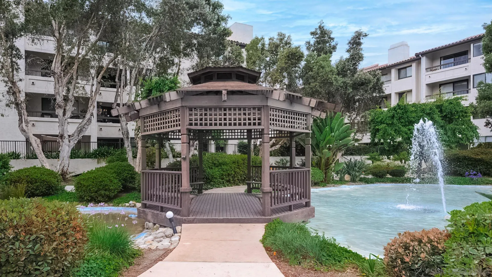 5845 Friars Road, Unit 1116 San Diego, CA 92110 - Photo 27 of 30 a view of a house with a yard