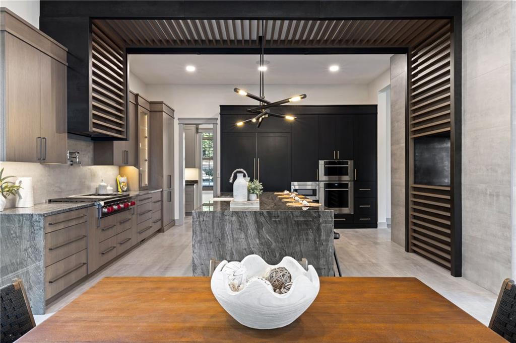 809 Mt Pleasant Road Mars, PA 16046 - Photo 13 of 46 a kitchen with a stove a refrigerator and cabinets