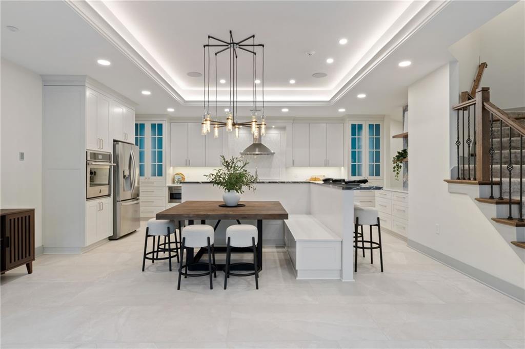 809 Mt Pleasant Road Mars, PA 16046 - Photo 25 of 46 a large kitchen with a table and chairs