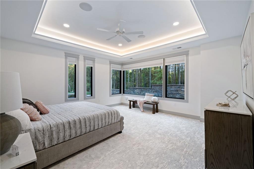 809 Mt Pleasant Road Mars, PA 16046 - Photo 33 of 46 a bedroom with a bed and large windows