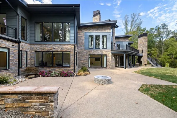 a front view of a house with yard