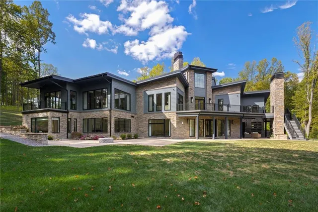 a view of a house with a swimming pool