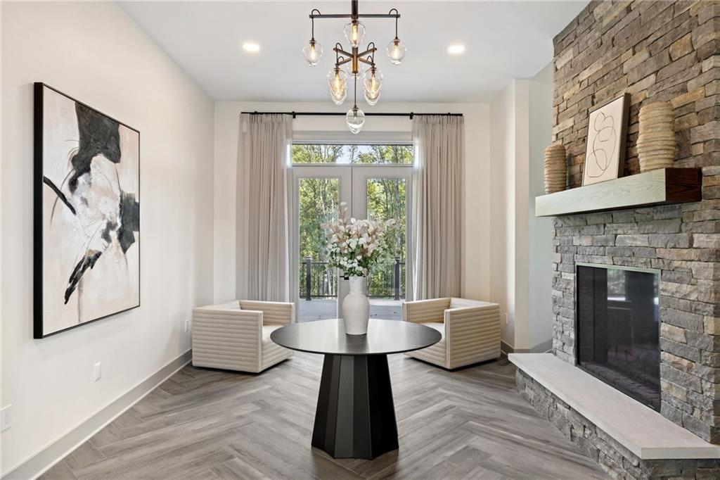 809 Mt Pleasant Road Mars, PA 16046 - Photo 4 of 46 a living room with furniture and a chandelier