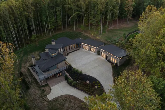 a wooden bench sitting in the middle of a forest