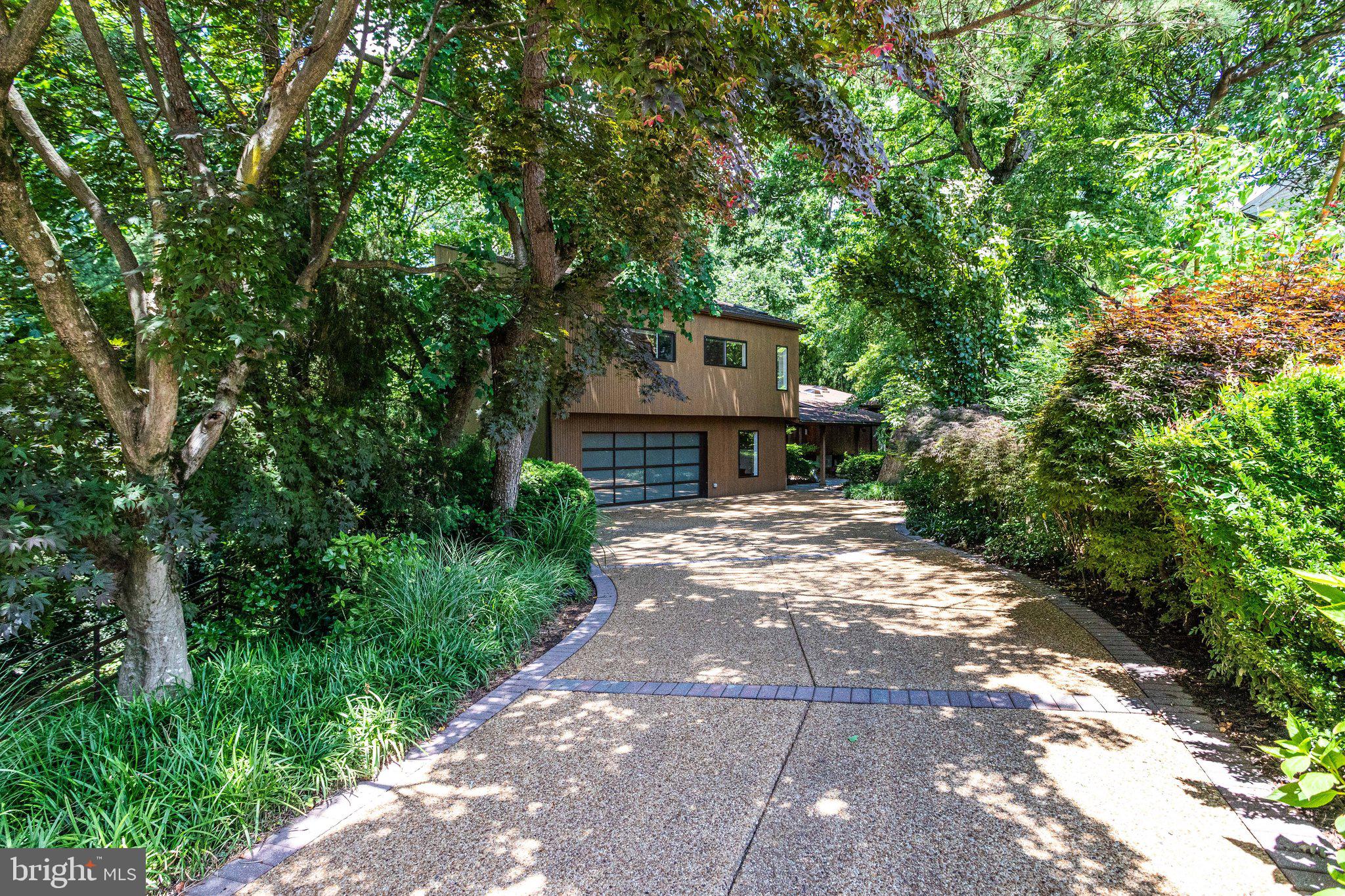 5910 Chesterbrook Road McLean, VA 22101 - Photo 2 of 53 Private entrance with concrete pea gravel driveway