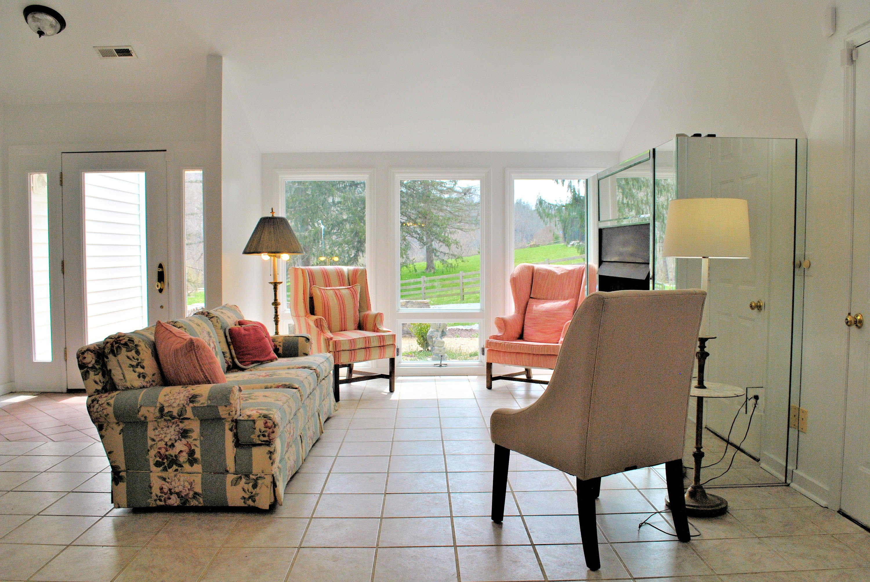 6500 Little Camp Road Riner, VA 24149 - Photo 17 of 121 a living room with furniture and a large window