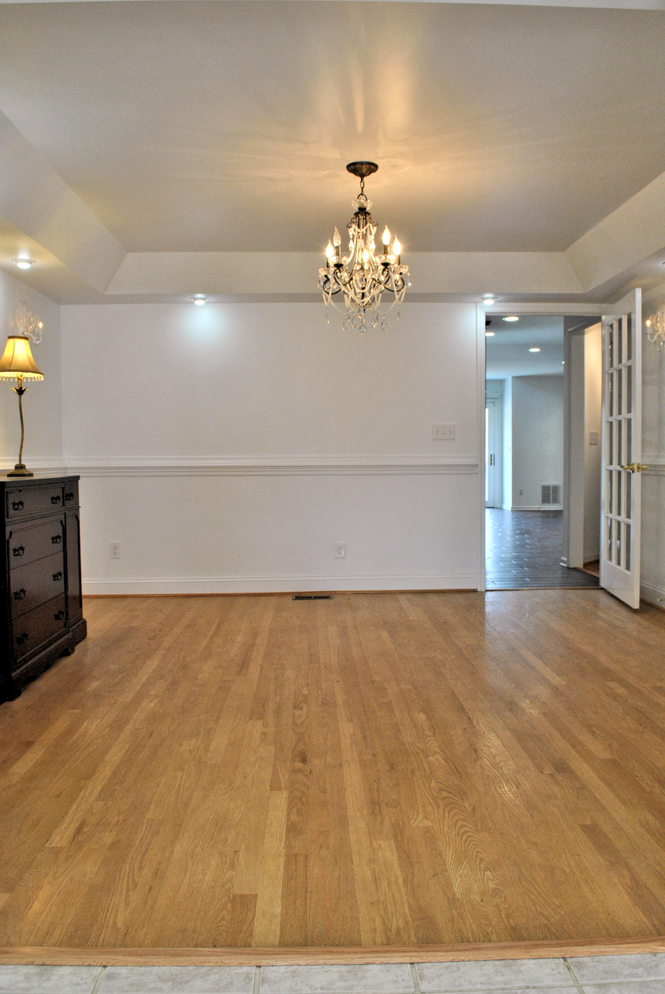 6500 Little Camp Road Riner, VA 24149 - Photo 19 of 121 a view of an empty room with a chandelier
