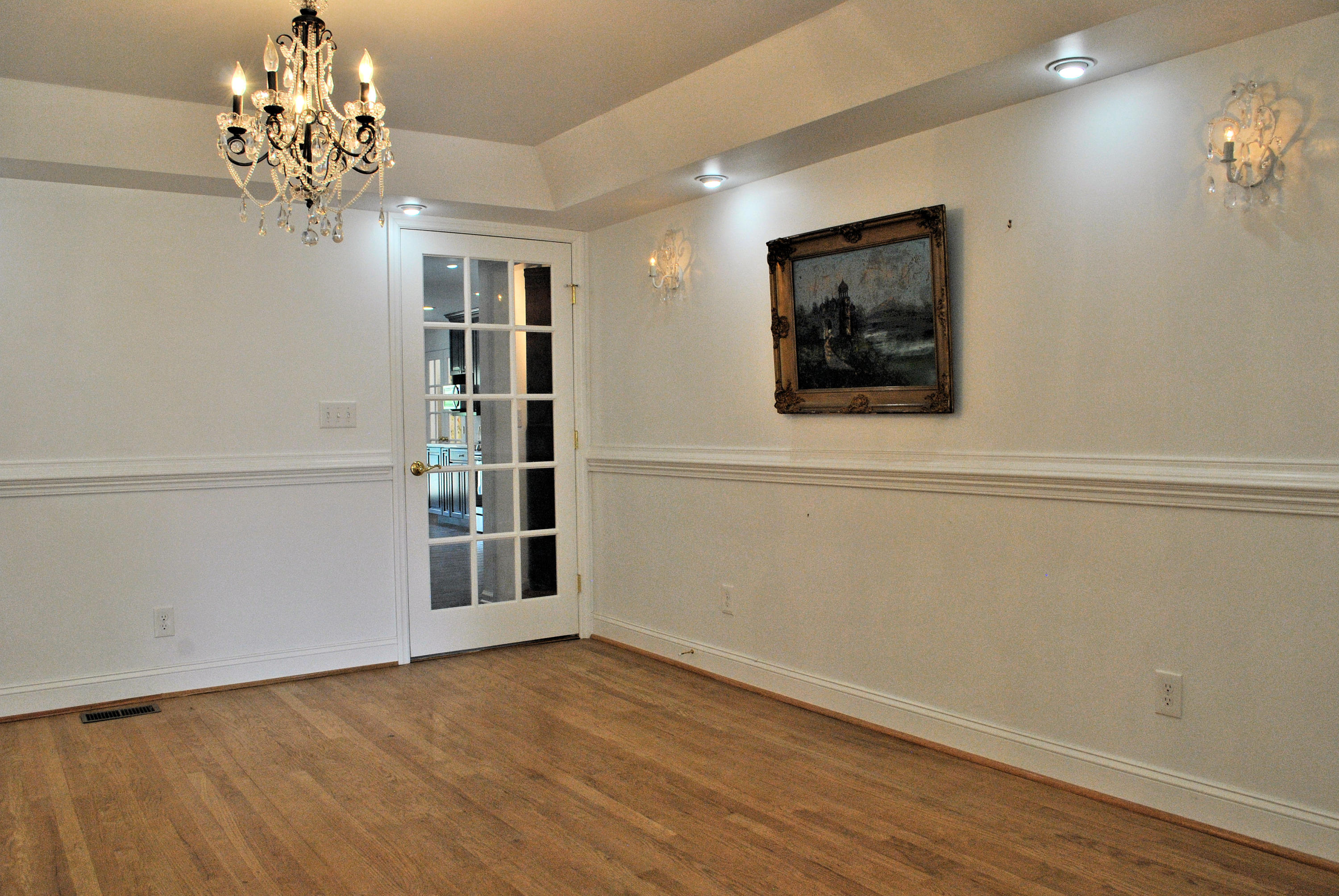 6500 Little Camp Road Riner, VA 24149 - Photo 21 of 121 a view of a big room with wooden floor and chandelier