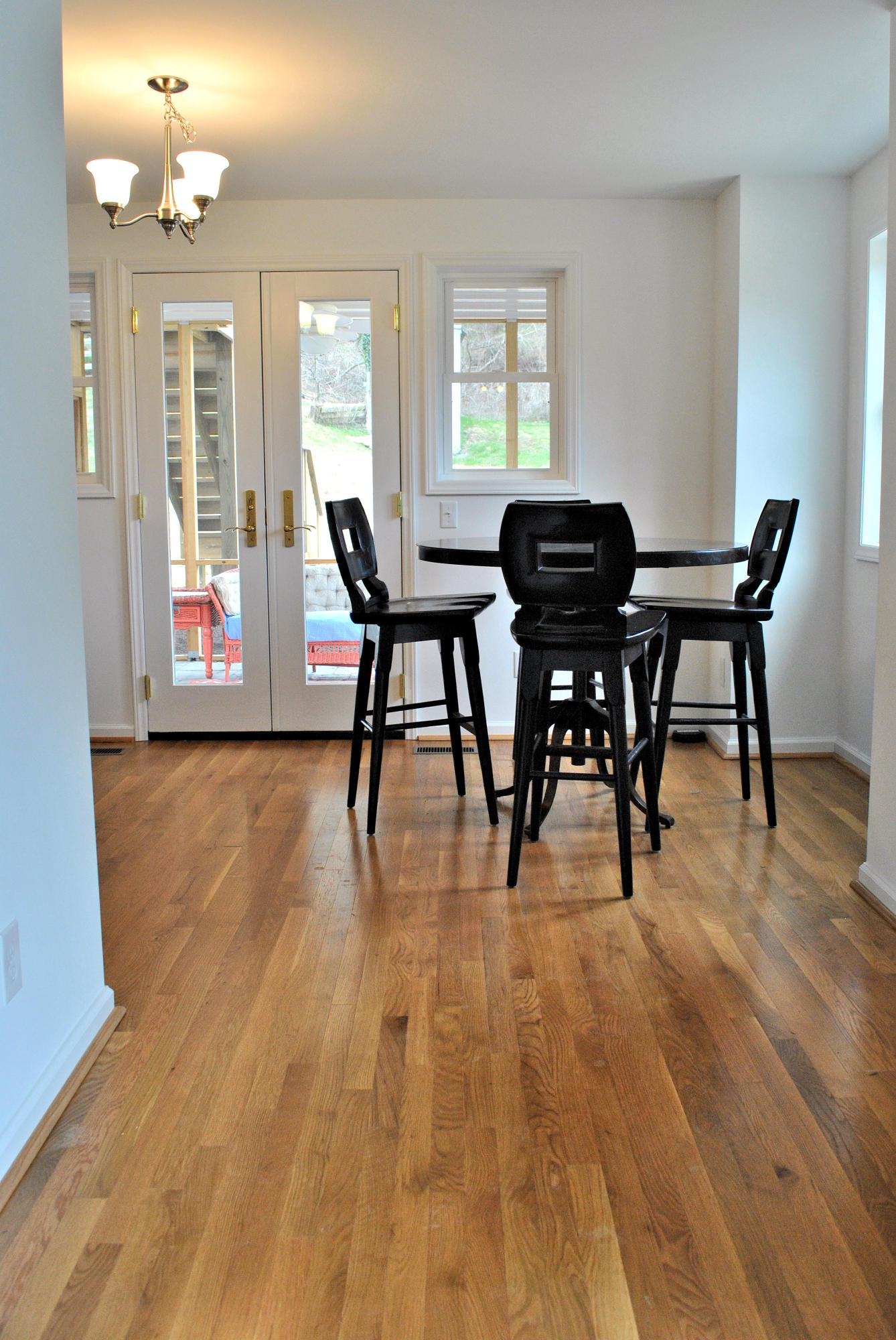 6500 Little Camp Road Riner, VA 24149 - Photo 29 of 121 a view of a dining room with furniture window and wooden floor