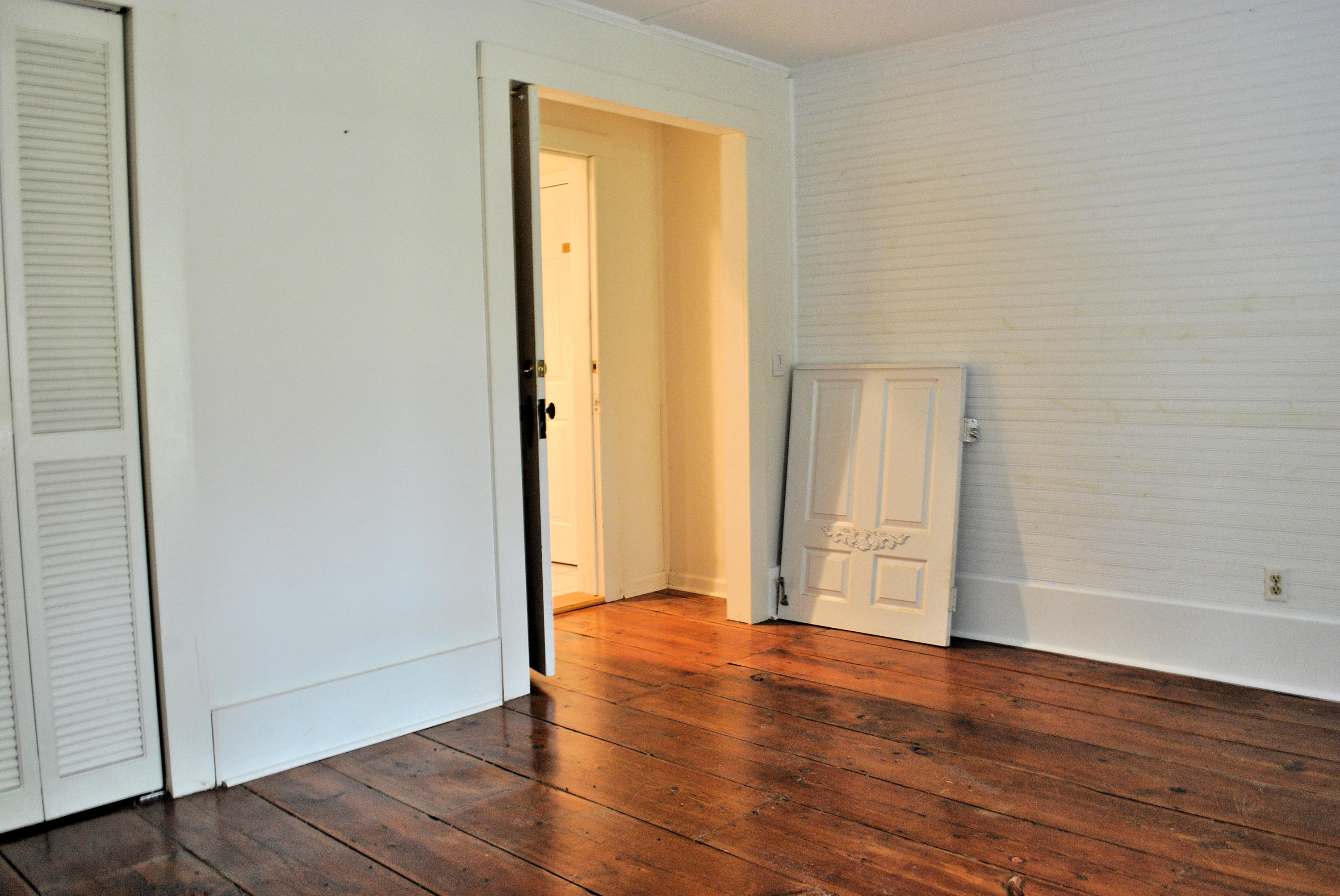 6500 Little Camp Road Riner, VA 24149 - Photo 61 of 121 an empty room with wooden floor and closet