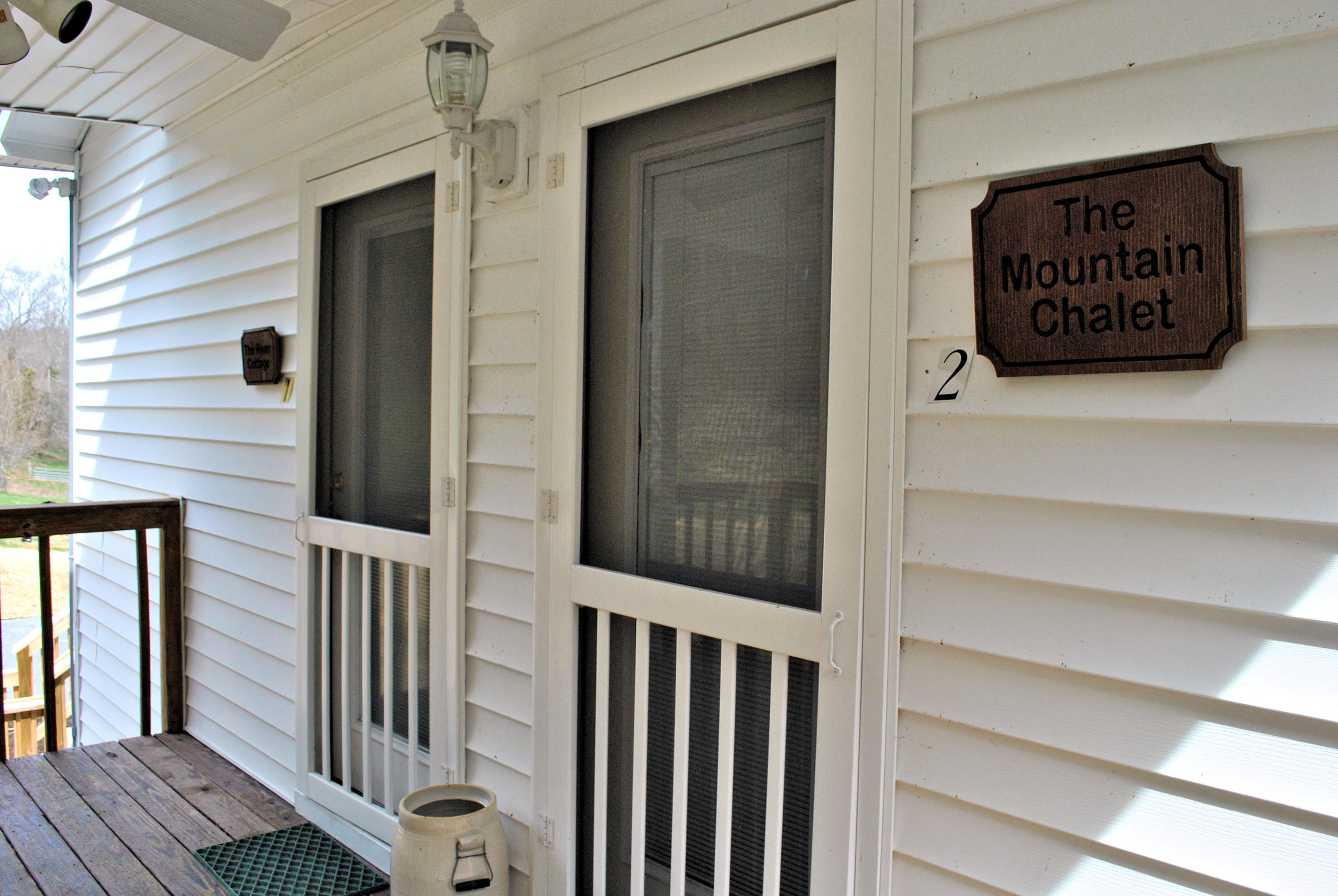 6500 Little Camp Road Riner, VA 24149 - Photo 85 of 121 a view of a wooden door and a window
