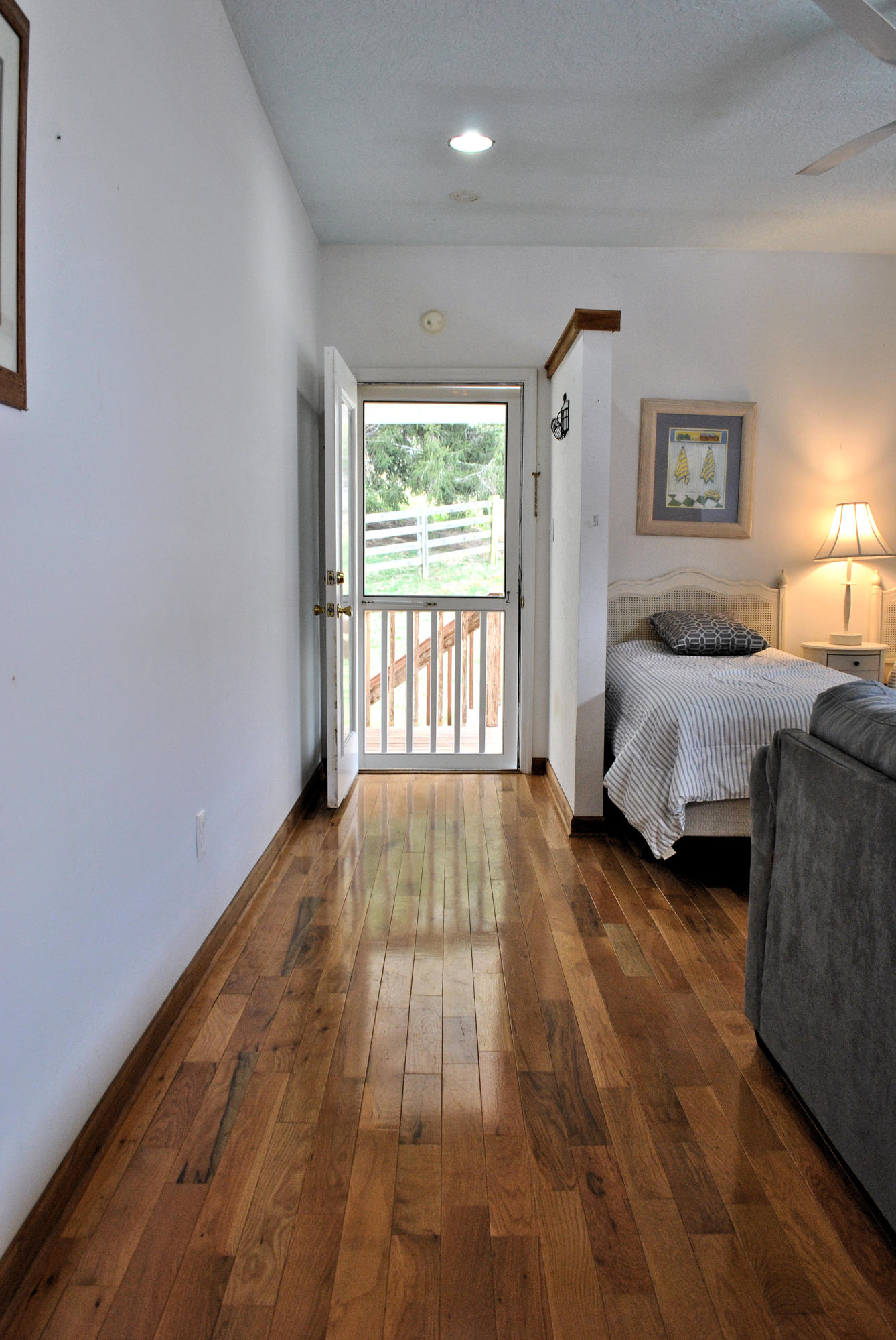 6500 Little Camp Road Riner, VA 24149 - Photo 89 of 121 a spacious bedroom with a bed and a large window