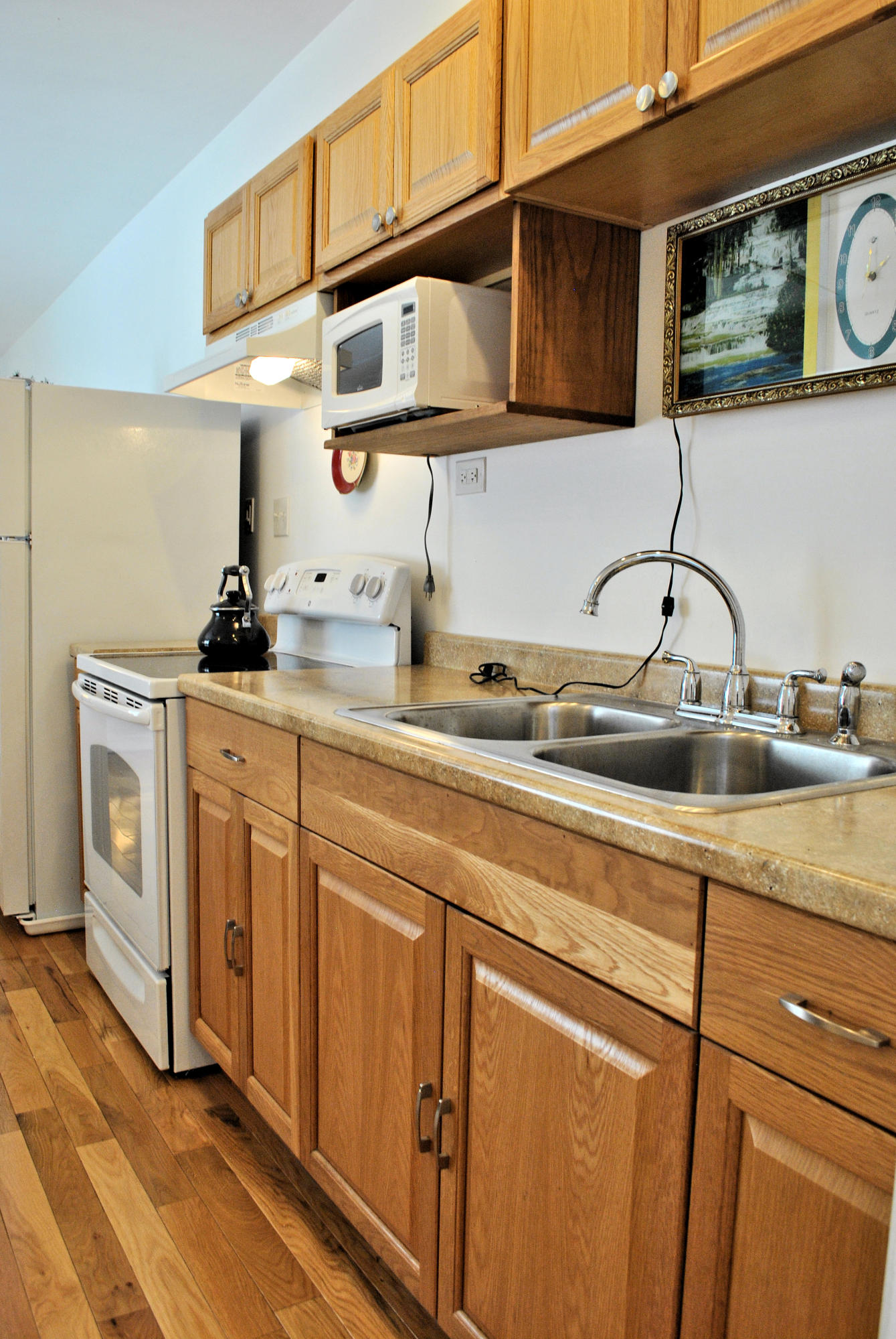 6500 Little Camp Road Riner, VA 24149 - Photo 100 of 121 a kitchen with stainless steel appliances granite countertop a sink a stove and cabinets