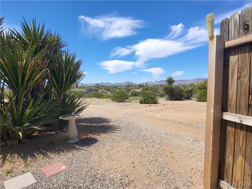 5397 Cordes Road Golden Valley, AZ 86413 - Photo 22 of 50 a view of a backyard of the house