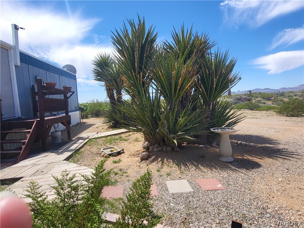 5397 Cordes Road Golden Valley, AZ 86413 - Photo 23 of 50 a view of a backyard of a house
