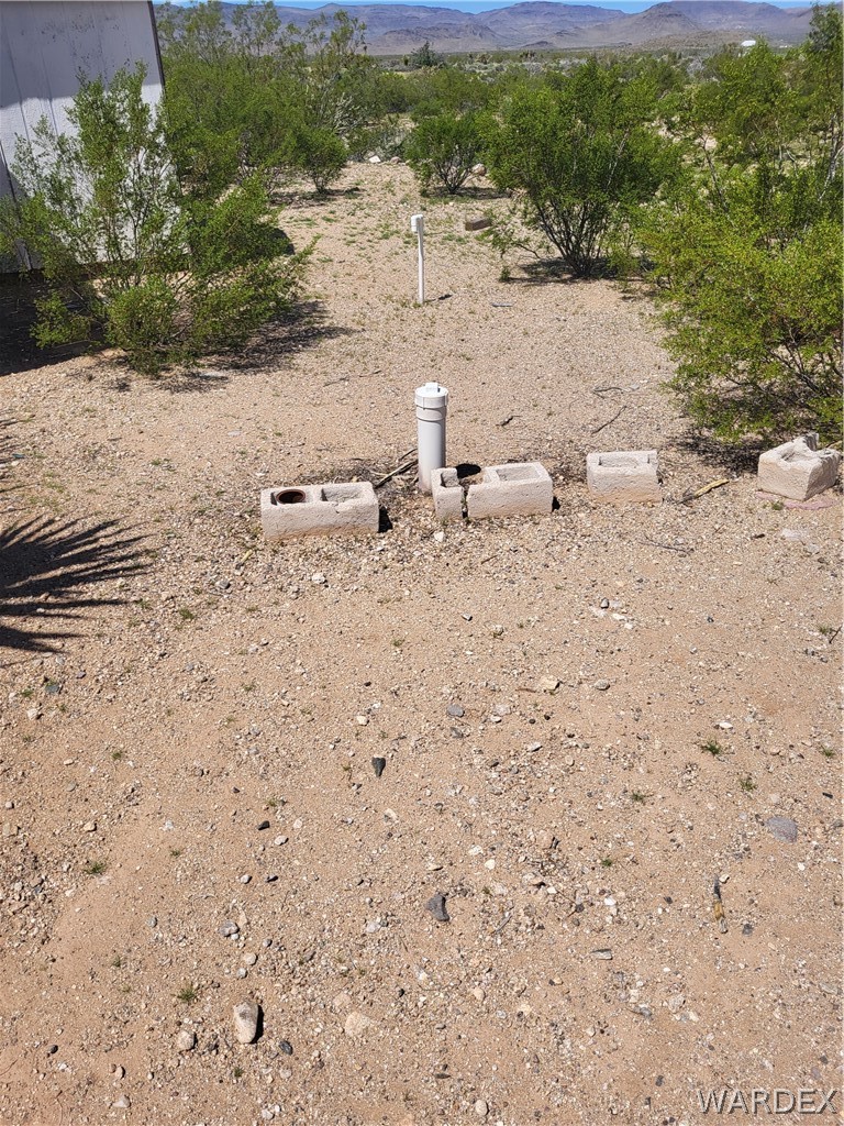 5397 Cordes Road Golden Valley, AZ 86413 - Photo 28 of 50 a view of beach and small yard